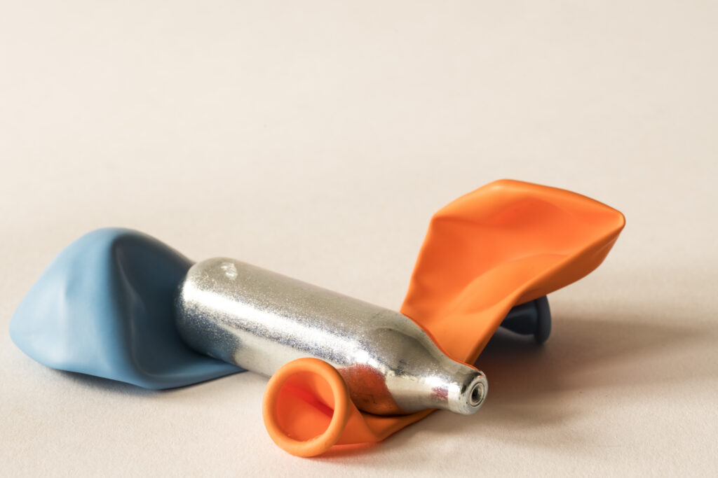 Nitrous oxide is a colorless gas that has legitimate medical and commercial uses. It has been used by medical and dental professionals for its anesthetic and pain-relieving effects. It is also used as a propellant in certain food products, including whipped cream chargers. In recent years, however, some nitrous oxide products have been marketed and used for recreational inhalation. Products can include small chargers as well as larger canisters and tanks, sometimes sold in different flavors and under a variety of brand names.